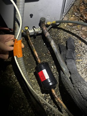 Leak Repair - When the install or repair guy before me thought an oversized coupling and globed under heated solder would do the trick. Being too close to the service valve was stressful, but being prepared with the proper products & tools makes for successful repair. New proper size coupling, new filter drier, nitrogen purge & proper evacuation, with fresh refrigerant. Leak Repair - When the install or repair guy before me thought an oversized coupling and globed under heated solder would do the trick. Being too close to the service valve was stressful, but being prepared with the proper products & tools makes for successful repair. New proper size coupling, new filter drier, nitrogen purge & proper evacuation, with fresh refrigerant.