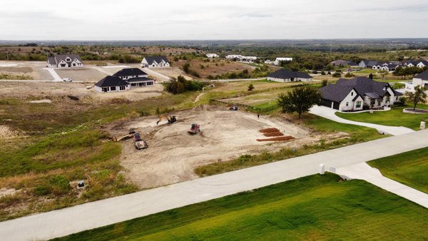 Lot Clearing and Building a Pad - We are here in Weatherford, TX clearing 1.5 acres of land and building a dirt pad for our client. He is about to build his dream home. We were able to complete this job in a week. Lot Clearing and Building a Pad - We are here in Weatherford, TX clearing 1.5 acres of land and building a dirt pad for our client. He is about to build his dream home. We were able to complete this job in a week.