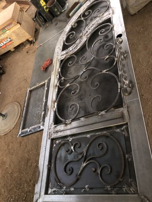 Front door in progress￼ - This custom front door is in progress.  Upon completion, this door metal tubing will be insulated with insulated glass and will be the front door to a special person. ￼￼