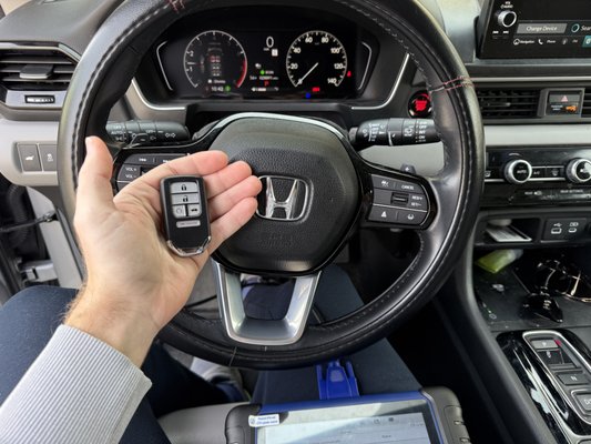 2024 Honda Pilot Spare key - Made a spare key for a 2024 Honda Pilot. Programmed the new key to the vehicle and verified all functions.