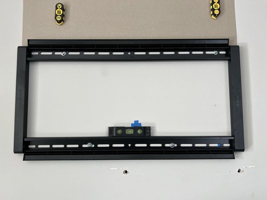 Lake Worth, FL — TV Mounting Done Right with Soundbar Mounting - Our customer had an existing mount on the wall and was concerned it would not hold their new 82-inch TV. They were right! The current support was mounted incorrectly and attached to plain drywall.
We replaced the existing mount with a customer-supplied TV mount and attached it to the wall studs. We covered the holes from the previous tv mount. Lake Worth, FL — TV Mounting Done Right with Soundbar Mounting - Our customer had an existing mount on the wall and was concerned it would not hold their new 82-inch TV. They were right! The current support was mounted incorrectly and attached to plain drywall.
We replaced the existing mount with a customer-supplied TV mount and attached it to the wall studs. We covered the holes from the previous tv mount.