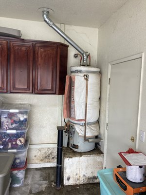 Water Heater Replacement - Replacement of an existing water heater that had been leaking for only one week.  Don't wait until it's too late.  Waiting until it leaks can dramatically increase the cost.