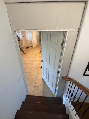 Temporary door install - Customer is going out of the country for 9 months and are renting out there home. They wanted a temporary door to prevent renters from going to the downstairs area. We accomplished this mission by adding new framing, drywall, and door with lock. The door was installed at the base of the stairs. Temporary door install - Customer is going out of the country for 9 months and are renting out there home. They wanted a temporary door to prevent renters from going to the downstairs area. We accomplished this mission by adding new framing, drywall, and door with lock. The door was installed at the base of the stairs.