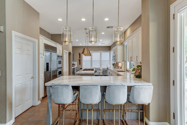 Modern Kitchen Refresh - The goal was to refresh the space, modernize the look, and bring everything together with a clean, cohesive design.
This project included replacing the countertops, updating the cabinet hardware, installing new light fixtures, and refreshing the color palette throughout the kitchen. Each element was carefully selected to complement one another—giving the space a brighter, more modern feel while keeping the existing layout intact.
The new countertops added a sleek, updated surface, while the hardware and lighting brought in a more contemporary touch. Finishing it off with updated colors tied everything together, creating a fresh and inviting space. The result is a kitchen that feels completely renewed Modern Kitchen Refresh - The goal was to refresh the space, modernize the look, and bring everything together with a clean, cohesive design.
This project included replacing the countertops, updating the cabinet hardware, installing new light fixtures, and refreshing the color palette throughout the kitchen. Each element was carefully selected to complement one another—giving the space a brighter, more modern feel while keeping the existing layout intact.
The new countertops added a sleek, updated surface, while the hardware and lighting brought in a more contemporary touch. Finishing it off with updated colors tied everything together, creating a fresh and inviting space. The result is a kitchen that feels completely renewed