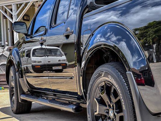 Ceramic Coatings - When buying a brand new vehicle, the first thing you should do is to get it protected with a ceramic coating to preserve its new condition for as long as possible. The sun’s UV rays and road contaminants are a lot more damaging than you may think and quickly degrade your car’s clear coat.

Even if your vehicle isn’t brand new, you can bring it in for a coating service and it will undergo a two-stage paint correction prior to the coating application. This will bring your vehicle’s paintwork back to like-new conditions, or better, and keep it well protected for years. This is the main reason it is significantly cheaper to ceramic coat your vehicle when it is brand new.

On top of the boost in protection, a ceramic coating will enhance the color saturation of your car’s paint, giving it an ultra high gloss finish. Darker vehicles will have a much deeper, mirror-like finish while lighter vehicles will produce a brighter, brilliant shine.