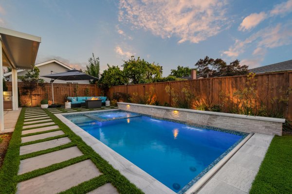 The Vista Park Project | Backyard Remodel - The Vista Park Project | San Jose, CA

A true transformation - this project is a perfect example of how a simple backyard can be reimagined into a refined, resort-style retreat for year-round enjoyment. From concept to completion, our team handled every detail. The space was completely redesigned and brought to life with a custom-built pool and spa featuring an automatic cover, complemented by a motorized louvered pergola, a fully equipped outdoor kitchen, and thoughtfully curated hardscape, landscape, and lighting throughout. Our in-house team managed the entire process, including design, architectural plans, and city permitting, ensuring a seamless transition from vision to reality.

We’re incredibly proud of this project - and even more so knowing our clients now enjoy their outdoor space every day.