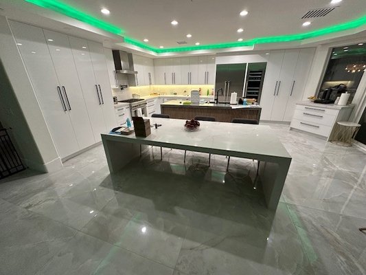 Remodel 2023 - This house was totally transformed and came out beautifully. Created this custom Quartz dining table with metal supports. Customer opted for LED lighting in kitchen soffit for more personal feel. Wood slats in kitchen island ties in with wood slats at fireplace. Remodel 2023 - This house was totally transformed and came out beautifully. Created this custom Quartz dining table with metal supports. Customer opted for LED lighting in kitchen soffit for more personal feel. Wood slats in kitchen island ties in with wood slats at fireplace.