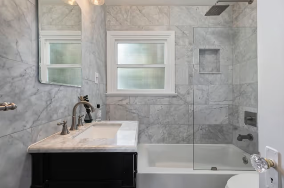 Residential/Commercial Bathrooms! - A Los Angeles marble bathroom finish repair where moisture-aware prep and clean detailing mattered around tile, fixtures and finished surfaces.

And 

A Culver City, CA 90232 church restroom repaint where a rough teal finish was changed to a cleaner modern black. Eddie prepped the walls around fixtures and old mounting points, then repainted the room to match the darker design direction used elsewhere in the building.