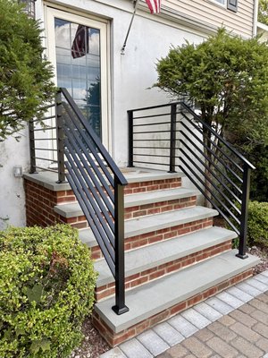 New front steps and steps railing - Another elegant front entry transformation by Uprise Construction LLC 
These steps were beautifully rebuilt using bluestone treads and red brick risers, paired with sleek black aluminum railings for a modern touch.
Strong, stylish, and built to last — quality craftsmanship you can trust! 
📞201-888-8943