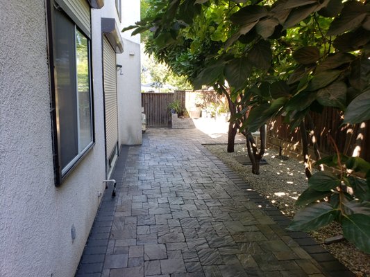 paver patio - couple was about to have their first child and wanted a better backyard and space for their daughter to play. removed old plants and pavers and replaced with new modern pavers.