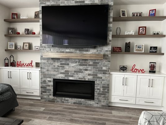 Entertainment center project 2022 San Bernardino - We added this entertainment center, tile work, mantel and floating shelves to this new home build in San Bernardino!! What a great space to show off all the family photos, decor and relax with the family to watch some TV!! Come visit our showroom and design center in Rancho Cucamonga today or call for your free estimate! Entertainment center project 2022 San Bernardino - We added this entertainment center, tile work, mantel and floating shelves to this new home build in San Bernardino!! What a great space to show off all the family photos, decor and relax with the family to watch some TV!! Come visit our showroom and design center in Rancho Cucamonga today or call for your free estimate!