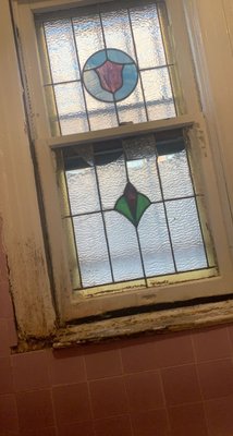 Aluminum D-H installation before and after installation - Customer asked for a window replacement on their bathroom and also the customer asked to add a marble on the bottom of the window since the old wood was all moldy.