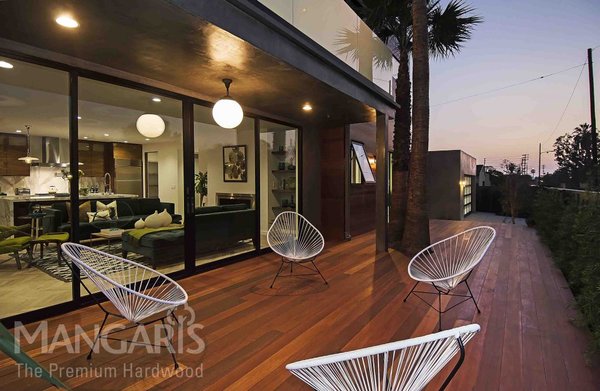 Mangaris Red Balau Hardwood Decking - Mangaris Red Balau Decking Hardwood is a testament to nature's artistry. Its captivating, deep red tones radiate warmth and sophistication, transforming any outdoor space into a sanctuary of timeless beauty. With an exquisite blend of rich hues and a subtle, yet intricate grain pattern, every plank is a work of natural artistry. This hardwood doesn't just enhance your deck; it elevates it to an unparalleled level of elegance. Resilient and enduring, it's a choice that stands the test of time, offering not only beauty but also durability. Embrace the enchantment of Mangaris Red Balau Decking Hardwood and let it infuse your outdoor oasis with a touch of nature's grandeur.