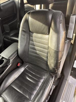 Ford Shelby custom front seats and door panels . - This customer was fired up about restoring their seats with 100% leather with red center inserts as well as carbon fiber door panels . We took our time and effort to bring this dream to life and leave our customer with a nothing but joy as they drove off happy to hit the road again .