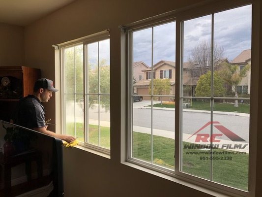 Home Window tinting in Murrieta, Ca to reduce heat and glare - This customer called us in an effort to reduce the amount of heat and glare coming in from west-facing windows. We installed a dual-reflective window film with an 85% total solar energy rejection. The film installed also provided a 99.99 UV rejection, and 94% glare reduction. We were able to effectively reduce high by almost 30 degrees.