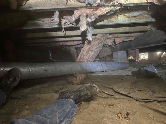 Crawlspace encapsulation - This crawlspace had very high moisture, causing high humidity in the crawl and home. This much moisture causes mold, insects, and wood to rot. We cleaned all the old insulation and debris out, killed the mold, installed a tear and mold resistant vapor barrier. Sealed crawlspace from outdoors and installed highly efficient dehumidifier made for crawlspaces. Replaced crawl entrance with new door and metal cover. Crawlspace encapsulation - This crawlspace had very high moisture, causing high humidity in the crawl and home. This much moisture causes mold, insects, and wood to rot. We cleaned all the old insulation and debris out, killed the mold, installed a tear and mold resistant vapor barrier. Sealed crawlspace from outdoors and installed highly efficient dehumidifier made for crawlspaces. Replaced crawl entrance with new door and metal cover.