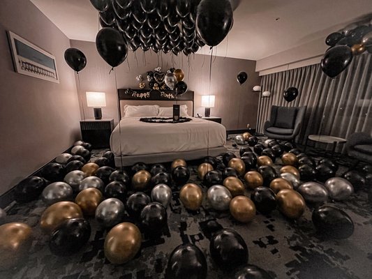 Room decoration - We make room decoration for your special dates which include balloons, rose petals on beds, helium balloons, balloon filled mural designs, personalized wine glasses, artificial candles, wine & cork screws, balloon released from the roof.