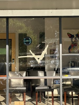 Solano, Napa, pet emergency hospital, broken window, emergency board up glass cleanup - Somebody had thrown a rock through the window being a pet hospital open 24 hours a day it was imperative to get this glass removed. We remove the glass put up a temporary board glass should take 7 to 14 days then we will go back to install it.