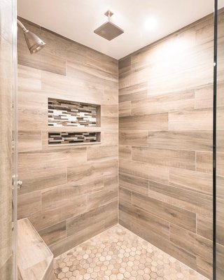 Shower Tile - Ask to see photos of completed jobs—especially ones similar to yours. Clean grout lines, level layouts, and tight corners say a lot more than words.