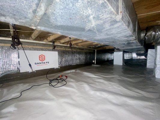 Hixson Tennessee - This Crawlspace was plagued with constant moisture and water intrusion.
We dug a full perimeter drainage system featuring two sump pumps with solid pvc lines, exiting below grade.
We then encapsulated the space with our reinforced vapor barrier and triplex insulation for the foundation walls.
The project was topped off with an always reliable Santa Fe 70! Hixson Tennessee - This Crawlspace was plagued with constant moisture and water intrusion.
We dug a full perimeter drainage system featuring two sump pumps with solid pvc lines, exiting below grade.
We then encapsulated the space with our reinforced vapor barrier and triplex insulation for the foundation walls.
The project was topped off with an always reliable Santa Fe 70!