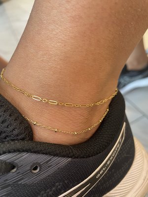 LINKED - Permanent Jewelry - Our linked for life permanent jewelry experience at The Nail Remedy. Bond together 14k gold, 14k gold filled, or sterling silver chains to create a clasp less non tarnish ring, bracelet, necklace, or anklet with your choice of chain.
Make this a fun bonding experience with your family, best friends, or significant other. Plan a linked for life date and BOOK NOW!
We have a variety of chains and charms to choose from, we take the measurement for flawless sizing and weld the pieces together with a quick spark! LINKED - Permanent Jewelry - Our linked for life permanent jewelry experience at The Nail Remedy. Bond together 14k gold, 14k gold filled, or sterling silver chains to create a clasp less non tarnish ring, bracelet, necklace, or anklet with your choice of chain.
Make this a fun bonding experience with your family, best friends, or significant other. Plan a linked for life date and BOOK NOW!
We have a variety of chains and charms to choose from, we take the measurement for flawless sizing and weld the pieces together with a quick spark!