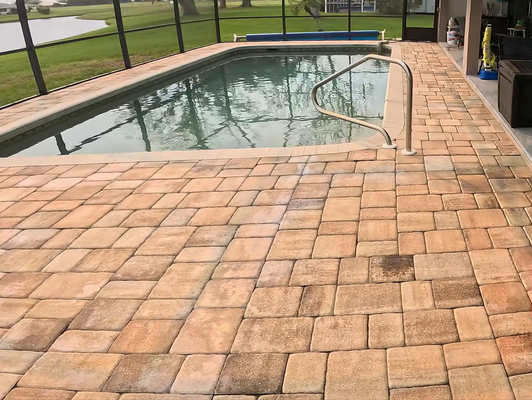 Pool Deck, Loose Pavers, new polymeric sand and sealer - This pool deck had some loose pavers on the pool deck. We leveled them out and applied a new layer of polymeric sand to help keep them locked in place, as well as those weeds and ants out. After that we coated the pavers with a recommended sealer.