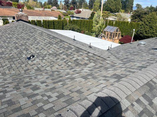 Residential Roof & Coating Restoration - Eugene, OR - Full roof replacement in Eugene using Owens Corning Duration shingles in Williamsburg Gray, along with a flat roof coating system to restore and protect low-slope areas. A complete upgrade for both function and appearance. Residential Roof & Coating Restoration - Eugene, OR - Full roof replacement in Eugene using Owens Corning Duration shingles in Williamsburg Gray, along with a flat roof coating system to restore and protect low-slope areas. A complete upgrade for both function and appearance.