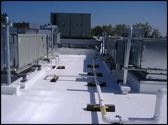 Commercial Cool Roof Systems - Just Leaks is the trusted source for the installation, maintenance, and repair of cool roof systems in San Jose and the SF Bay Area. We use AcryPly roofing systems to give your industrial roof top-of-the-line water resistance, reflective acrylic, and reinforced asphalt. These cool roof systems extend the life of your commercial roofs or industrial roofs and also help to lower your energy bills. To see examples of our work, we invite you to peruse through our cool roof systems gallery.

Installing new cool roof systems can make a drastic difference for your roofing system, both visually and functionally. Cool roof systems (aka “green roofs”) are also more sustainable than other means of roofing repair. Because of the fluid coating we use, cool roof systems function as reflective surfaces. They keep the roof cool to the touch even on hot summer days. The team at Just Leaks has ample amounts of experience maintaining, repairing, and installing these innovative and eco-friendly roofs throughout the San Jose and SF Bay Area. We believe the proof of our statements lie in the pictures our team has diligently and meticulously acquired over the years.