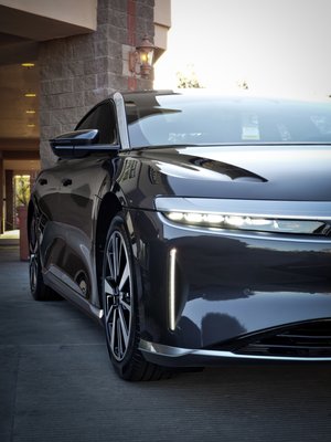 Lucid Air Ultimate Paint Protection Package - This 2023 Lucid Air came in straight from the Lucid dealership wanting to have the vehicle protected so it could be driven without worry. Our Ultimate paint protection film package was the clear move. This package covers all painted and trim portions to eliminate the concern of rock chips. The first step is to wash and clay bar the vehicle ensuring there is no contamination in the paint. After the vehicle is clean it is paint-corrected to eliminate scratches and swirl marks that accrued during shipping. To ensure a clean installation the vehicle must be prepped using a surface prep cleaner to remove any leftover compound from the previous step. Then the PPF application begins. Our "Reaction" PPF which comes with the ultimate package has a ceramic top coat built into the film to ensure maximum gloss retention and hydrophobic properties. Along with the self-healing technology and 8-millimeter thickness, this is the number one option for protecting your vehicle. Lucid Air Ultimate Paint Protection Package - This 2023 Lucid Air came in straight from the Lucid dealership wanting to have the vehicle protected so it could be driven without worry. Our Ultimate paint protection film package was the clear move. This package covers all painted and trim portions to eliminate the concern of rock chips. The first step is to wash and clay bar the vehicle ensuring there is no contamination in the paint. After the vehicle is clean it is paint-corrected to eliminate scratches and swirl marks that accrued during shipping. To ensure a clean installation the vehicle must be prepped using a surface prep cleaner to remove any leftover compound from the previous step. Then the PPF application begins. Our "Reaction" PPF which comes with the ultimate package has a ceramic top coat built into the film to ensure maximum gloss retention and hydrophobic properties. Along with the self-healing technology and 8-millimeter thickness, this is the number one option for protecting your vehicle.