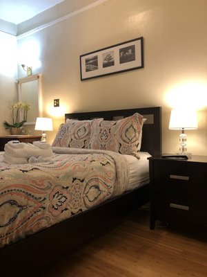 Room #4. Full size bed for 2 people. - The size of the room is 100 sq. ft. It features a sink and a TV. Free wi-fi. Shower and bathroom is few steps outside your room in the hallway. Room #4. Full size bed for 2 people. - The size of the room is 100 sq. ft. It features a sink and a TV. Free wi-fi. Shower and bathroom is few steps outside your room in the hallway.