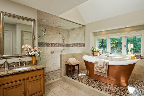 Bathroom Design & Renovation - Rustic Traditional is an effortless blend of nature-inspired textures with modern comforts to create a space with a soft elegance. See more beautiful transformations at https://www.kitchenandbathdesign.com/our-projects/ Bathroom Design & Renovation - Rustic Traditional is an effortless blend of nature-inspired textures with modern comforts to create a space with a soft elegance. See more beautiful transformations at https://www.kitchenandbathdesign.com/our-projects/