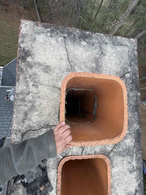 Chimney Crown Repair & Cap Installation - Customer had leaks and called us to fix their chimney's leaking issue. We repaired the crown and installed brand new caps to prevent the leaking. Chimney Crown Repair & Cap Installation - Customer had leaks and called us to fix their chimney's leaking issue. We repaired the crown and installed brand new caps to prevent the leaking.