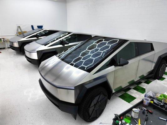 We Specialize in Teslas - From Cybertruck wraps to Model 3s, we do it all. We have hundreds of colors to choose from. Whether you are looking for a textured or colored paint protection film, to colored vinyl wrap. We do it all! We Specialize in Teslas - From Cybertruck wraps to Model 3s, we do it all. We have hundreds of colors to choose from. Whether you are looking for a textured or colored paint protection film, to colored vinyl wrap. We do it all!