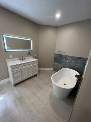 Bathroom Remodel in Houston - High-end bathroom renovation. Featuring a custom walk-in shower, floating bench, and premium tile work. Serving the Greater Houston area. Bathroom Remodel in Houston - High-end bathroom renovation. Featuring a custom walk-in shower, floating bench, and premium tile work. Serving the Greater Houston area.