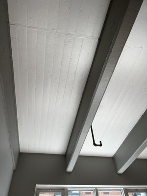 High Ceiling Painted in two colors - High ceiling painted with several colors creating an interesting industrial effect. High Ceiling Painted in two colors - High ceiling painted with several colors creating an interesting industrial effect.