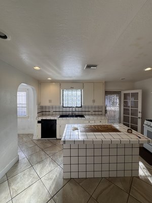 Full Kitchen Gut & Redesign - From closed-off to open concept! This kitchen underwent a complete transformation from top to bottom.
✔️ Removed a load-bearing wall to create an open, modern layout
✔️ Complete kitchen demolition and rebuild
✔️ New insulation and drywall throughout
✔️ Gardenia White frameless shaker cabinetry with soft-close doors and drawers
✔️ Quartz countertops with waterfall-style island
✔️ Gloss subway tile backsplash
✔️ New luxury vinyl plank flooring throughout
✔️ Recessed lighting and modern pendant lighting
✔️ New plumbing fixtures, hardware, and finish carpentry
✔️ Fresh interior pa
What was once a dated kitchen with tile countertops and limited functionality is now a bright, open space designed for everyday living and entertaining.
Thinking about remodeling your kitchen? Contact Jaber Remodeling today for a free in-home estimate. Full Kitchen Gut & Redesign - From closed-off to open concept! This kitchen underwent a complete transformation from top to bottom.
✔️ Removed a load-bearing wall to create an open, modern layout
✔️ Complete kitchen demolition and rebuild
✔️ New insulation and drywall throughout
✔️ Gardenia White frameless shaker cabinetry with soft-close doors and drawers
✔️ Quartz countertops with waterfall-style island
✔️ Gloss subway tile backsplash
✔️ New luxury vinyl plank flooring throughout
✔️ Recessed lighting and modern pendant lighting
✔️ New plumbing fixtures, hardware, and finish carpentry
✔️ Fresh interior pa
What was once a dated kitchen with tile countertops and limited functionality is now a bright, open space designed for everyday living and entertaining.
Thinking about remodeling your kitchen? Contact Jaber Remodeling today for a free in-home estimate.
