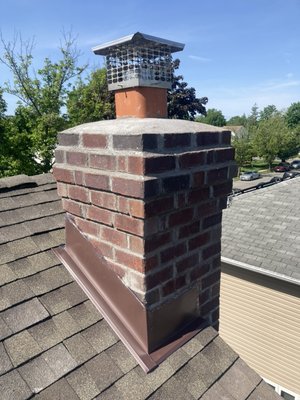 Chimney bricks - New chimney bricks and flashing. Demolish top section of existing chimney down to stable structure. Rebuild using new bricks and mortar to match original dimensions. Install new step flashing and counter flashing integrated under roofing and siding. Apply waterproof sealant to all exposed joints for full weatherproofing. Chimney bricks - New chimney bricks and flashing. Demolish top section of existing chimney down to stable structure. Rebuild using new bricks and mortar to match original dimensions. Install new step flashing and counter flashing integrated under roofing and siding. Apply waterproof sealant to all exposed joints for full weatherproofing.