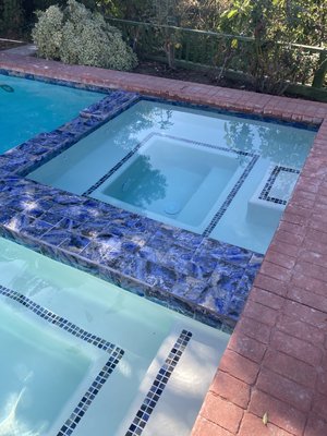 White Pool Plaster with New Blue Tile - This project had 4 cracks in the swimming pool and plumbing that was leaking. We were able to fix all of the cracks and replace all of the plumbing.
With a touch of new tile, trim tile and Plaster this pool is back up and running. Presentable, clean and ready for the next pool party!!!