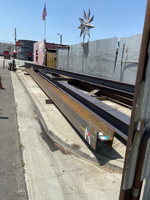 Metal building - Steel columns to be erected after base plate has been welded Metal building - Steel columns to be erected after base plate has been welded