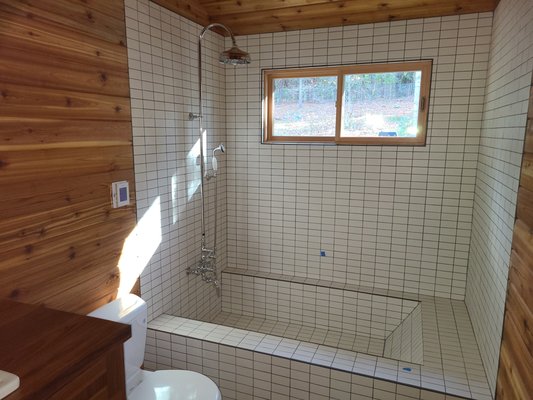 custom roman tub - With the help of our great tile guy Jeff Orcino, we designed this custom Roman soaker tub.  Stunning.  Same remodel, custom wet bath.