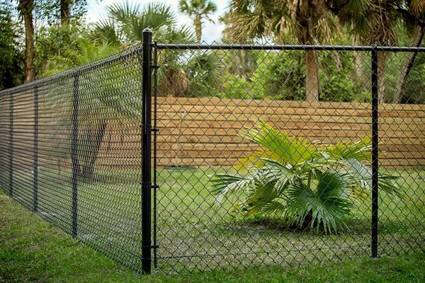 Black Coated Chain Link fence - Stogner and better looking security fence Black Coated Chain Link fence - Stogner and better looking security fence