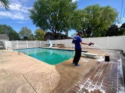 Pressure wash of pool deck - Pressure washing a pool deck removes dirt, grime, and algae buildup, restoring its clean, slip-resistant surface. The high-powered water stream effectively blasts away stains, leaving your pool area fresh and looking like new. Perfect for maintaining a safe and inviting outdoor space!