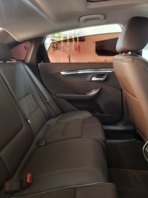 2014 Chevy Impala Remove & Re-tint - 2014 Chevrolet Impala came in with burnt bubbled film. We removed all the film and placed our Ceramic Film with a lifetime warranty.