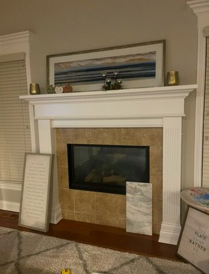 New marble tile for a fireplace - We performed this little fireplace remodel for a customer today, removing the old tile building a new walls with concrete boards. And finish a nice pieces of marble. Design credits for my customer