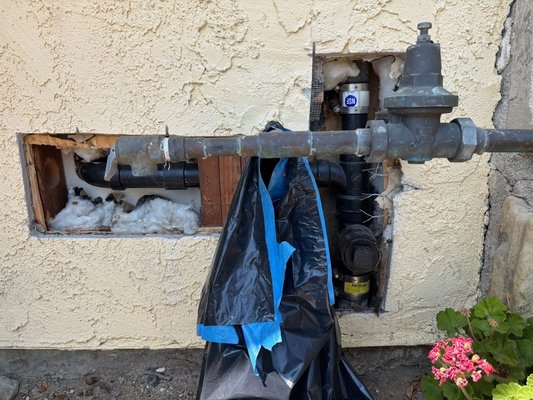 After plumbing job, stucco repairing. - After plumbing stucoo repair.