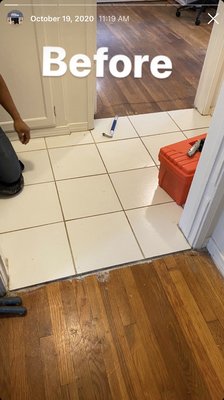 Hardwood Floors - What we did here was make the whole floor space look bigger by taking out the tile and connecting the two hardwood floors together.