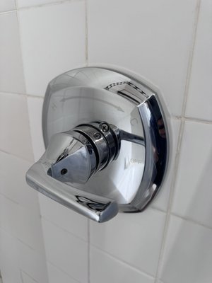 Deep Cleaning – Before & After - deep cleaning with before and after results. Removed hard water stains, soap scum, and buildup from fixtures and tile, then polished and sanitized all surfaces for a clean, refreshed finish.