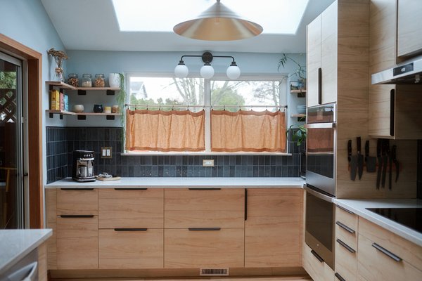 Kitchen Remodel Design - We dramatically updated the layout to bring greater functionality, flow, and aesthetic appeal to this kitchen, the heart of the home. The original layout posed several challenges—including limited storage, inefficient flow, outdated finishes, and a lack of natural light—all of which were addressed through thoughtful space planning and material selection.
As the interior designer on the project, my goal was to create a kitchen that felt both timeless and tailored to the client’s lifestyle. We reimagined the layout to improve circulation and maximize usable space, incorporating custom cabinetry, upgraded appliances, and efficient storage solutions throughout.
A cohesive palette of finishes was selected to balance warmth and modernity, including durable quartz countertops, high-performance red oak flooring, and statement lighting that elevates both task and ambient zones. Every design decision was made with the client’s daily routines and entertaining style in mind.
This remodel not only enhanced the visual appeal of the kitchen but also transformed how the space supports the flow of everyday life. Kitchen Remodel Design - We dramatically updated the layout to bring greater functionality, flow, and aesthetic appeal to this kitchen, the heart of the home. The original layout posed several challenges—including limited storage, inefficient flow, outdated finishes, and a lack of natural light—all of which were addressed through thoughtful space planning and material selection.
As the interior designer on the project, my goal was to create a kitchen that felt both timeless and tailored to the client’s lifestyle. We reimagined the layout to improve circulation and maximize usable space, incorporating custom cabinetry, upgraded appliances, and efficient storage solutions throughout.
A cohesive palette of finishes was selected to balance warmth and modernity, including durable quartz countertops, high-performance red oak flooring, and statement lighting that elevates both task and ambient zones. Every design decision was made with the client’s daily routines and entertaining style in mind.
This remodel not only enhanced the visual appeal of the kitchen but also transformed how the space supports the flow of everyday life.