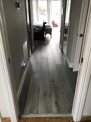 Master Bedroom - This pre-finished floor was installed in the master bedroom and office. The floor is high quality engineered with a 4mm wear layer. Master Bedroom - This pre-finished floor was installed in the master bedroom and office. The floor is high quality engineered with a 4mm wear layer.