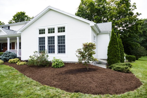 Flowerbeds Maintenance - Mulch installation and shrub trimming. Flowerbeds Maintenance - Mulch installation and shrub trimming.